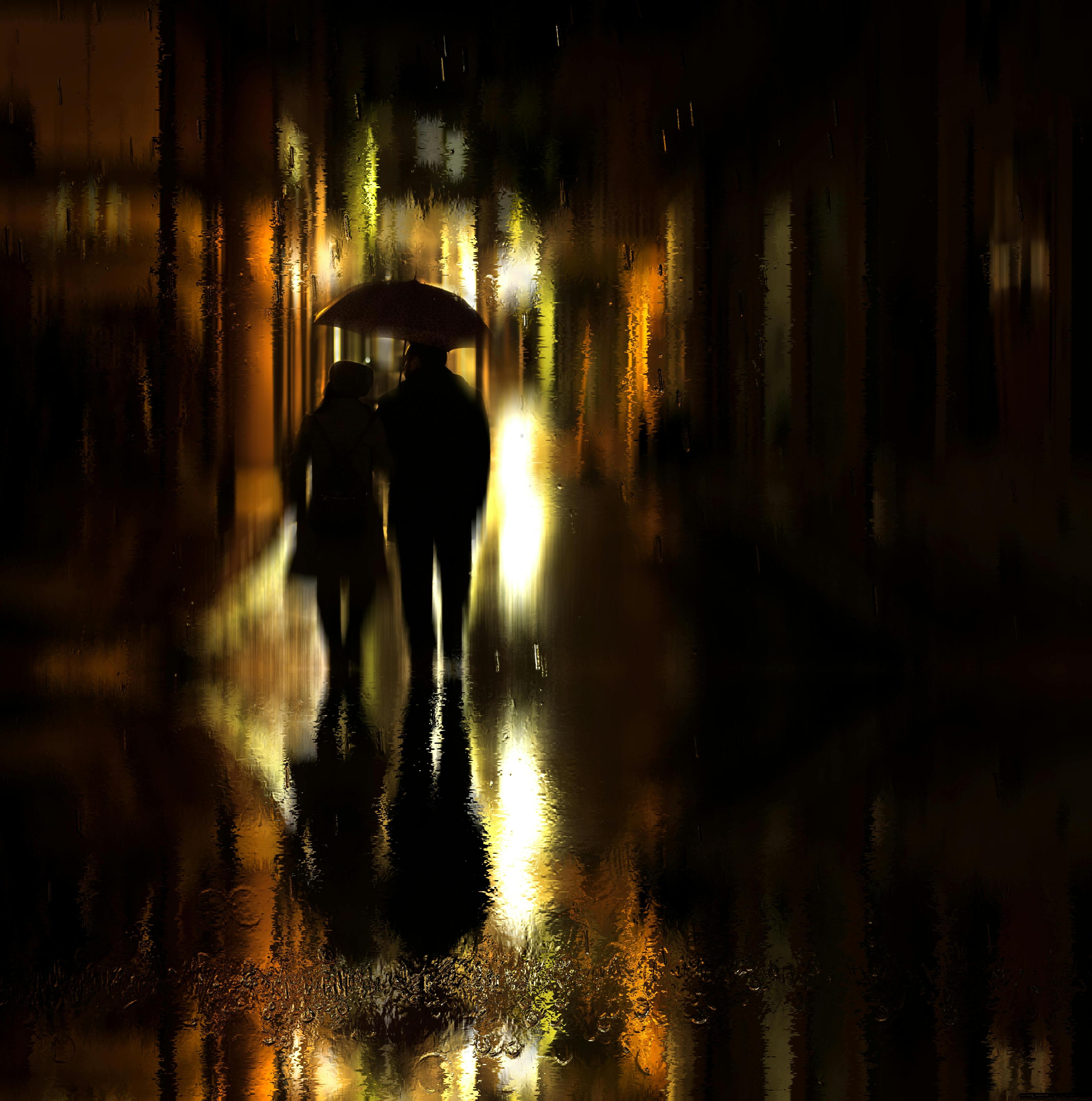A couple with an umbrella walks on a rainy night street, reflecting street lights in abstract silhouette.