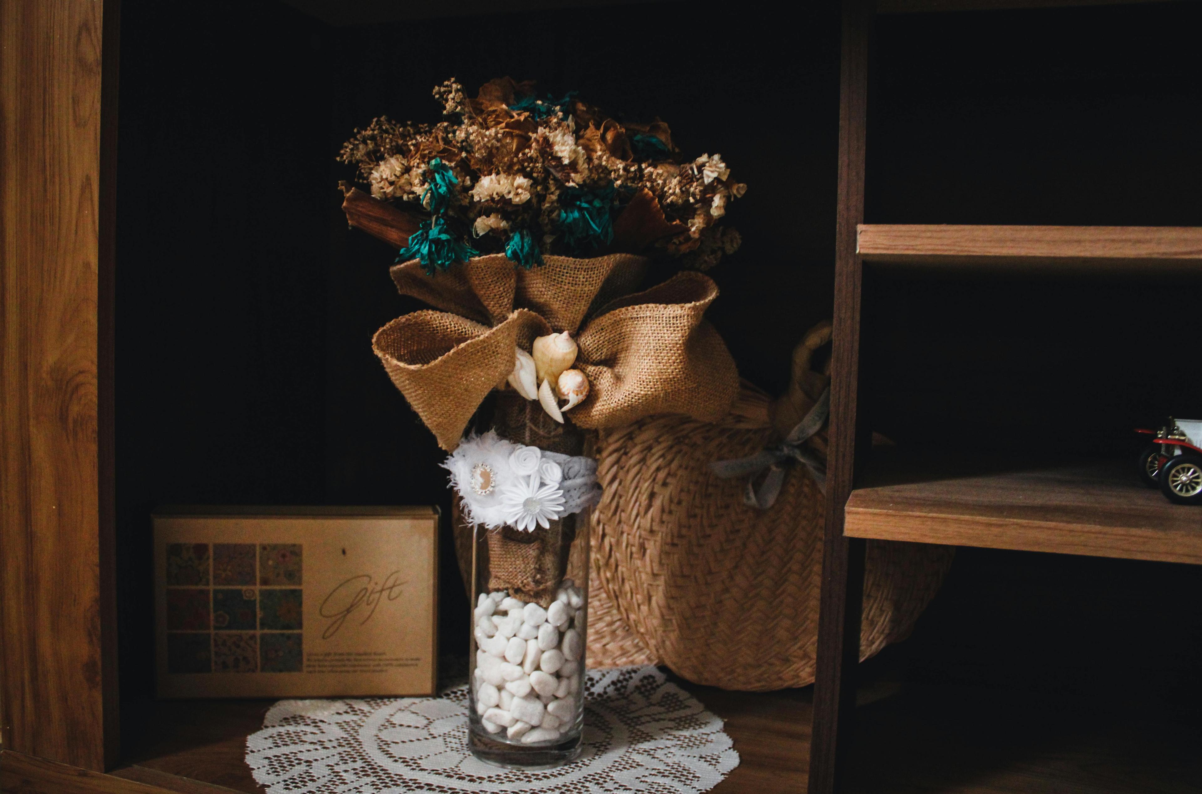 Brown and Blue Flower Decor on Glass Vase