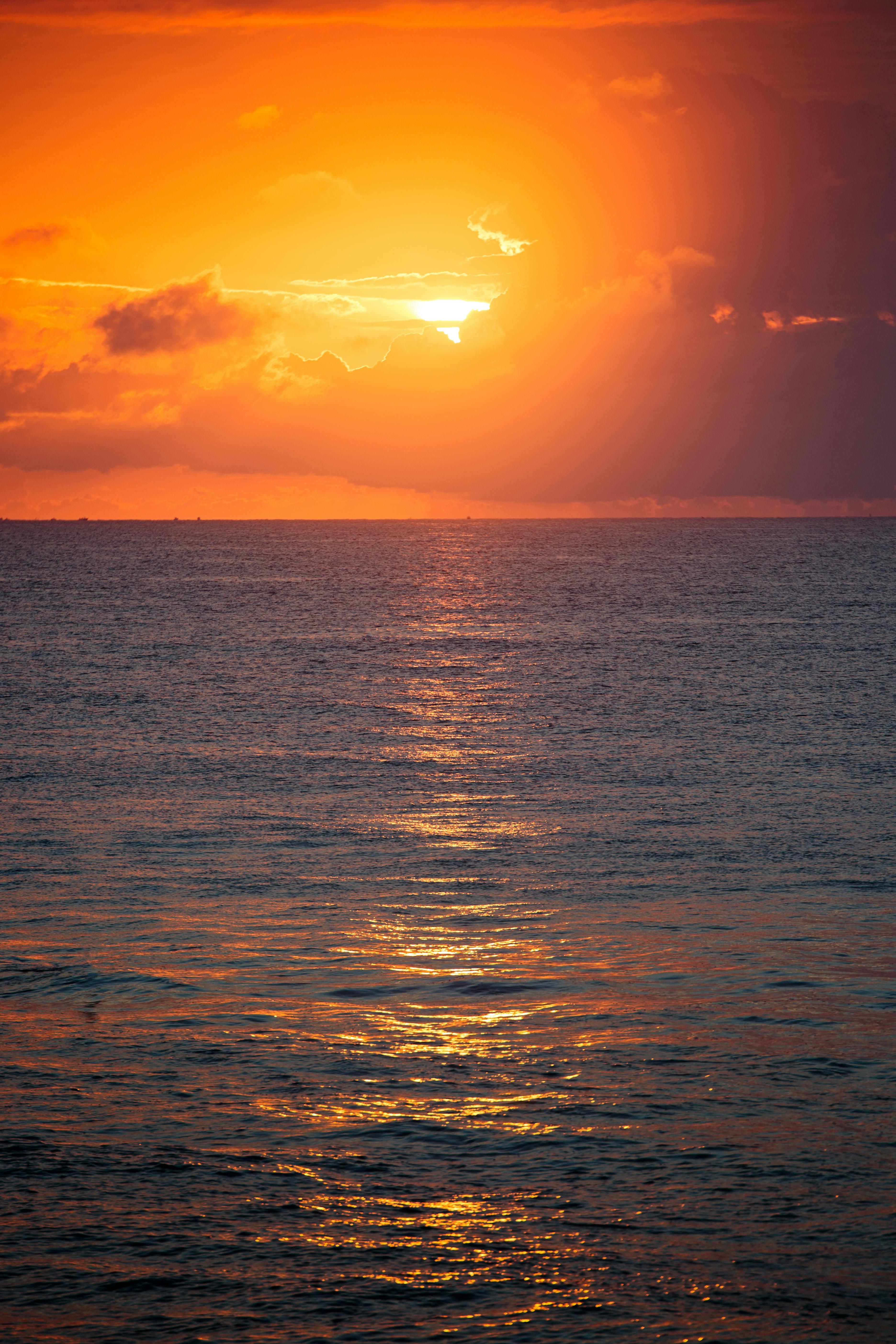 Photo of Calm Body of Water during Golden Hour