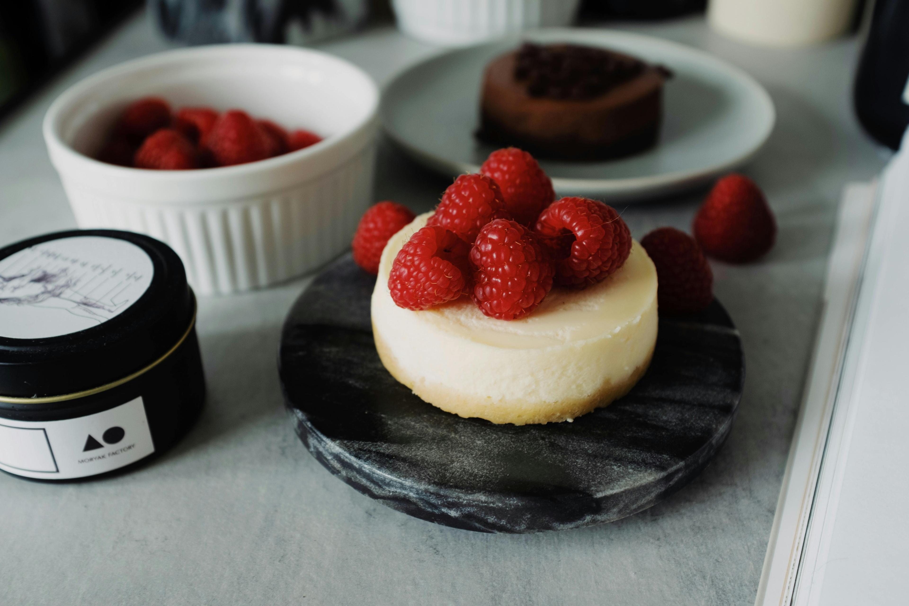 Raspberries On Top Of A Cake