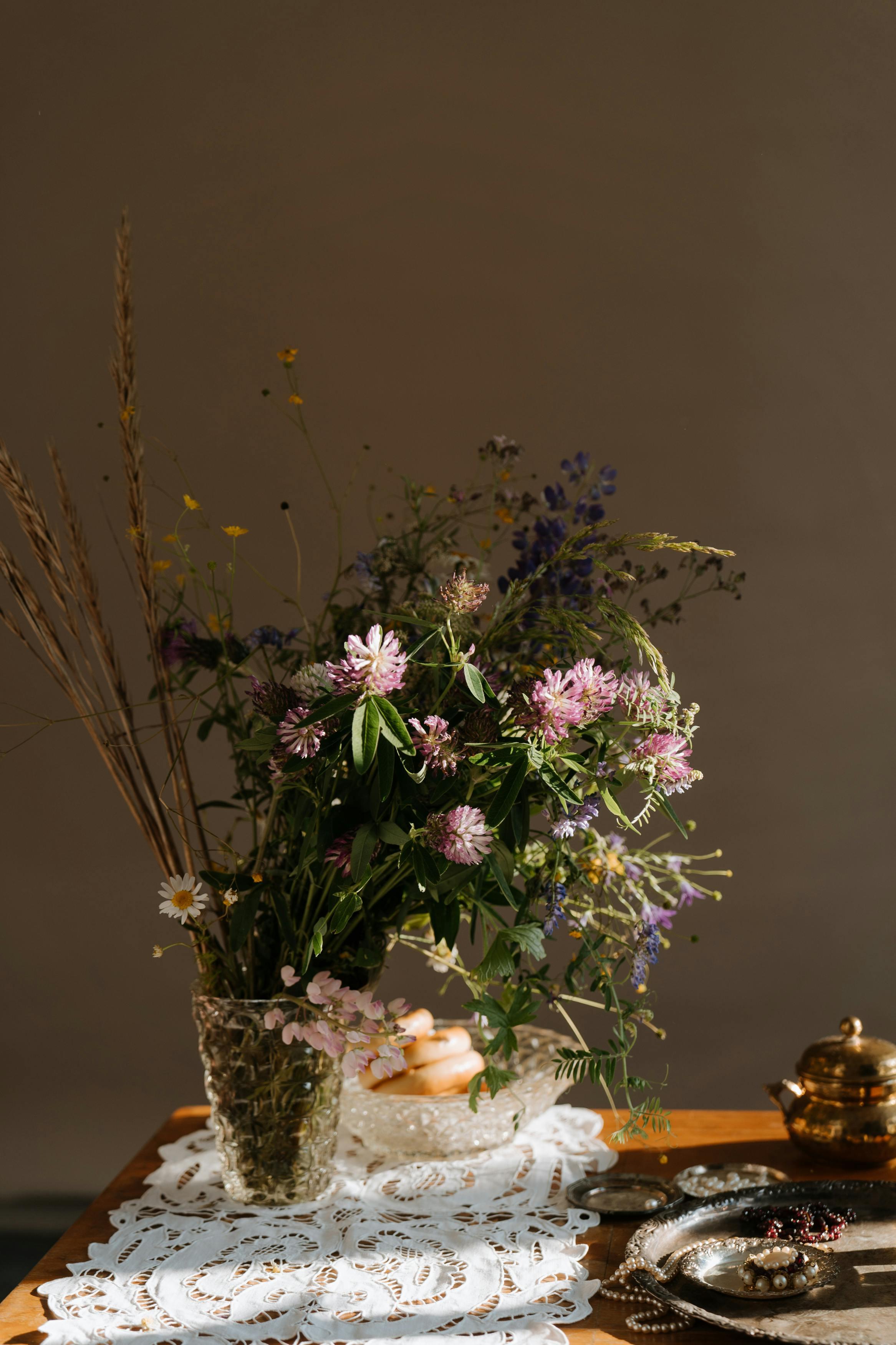 Purple and White Flowers in Brown Wicker Basket