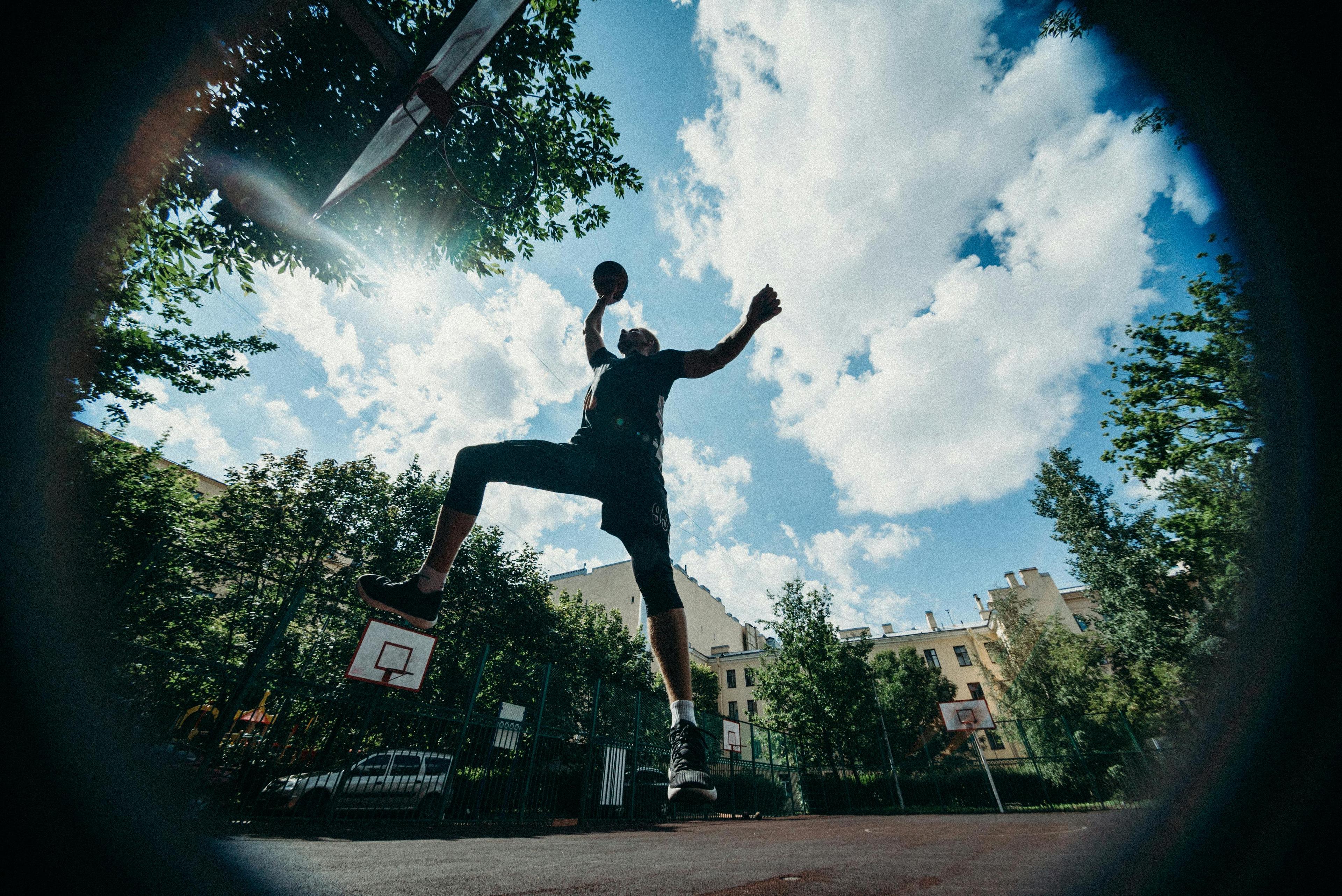 Jump Shot of a Person Playing Basketball