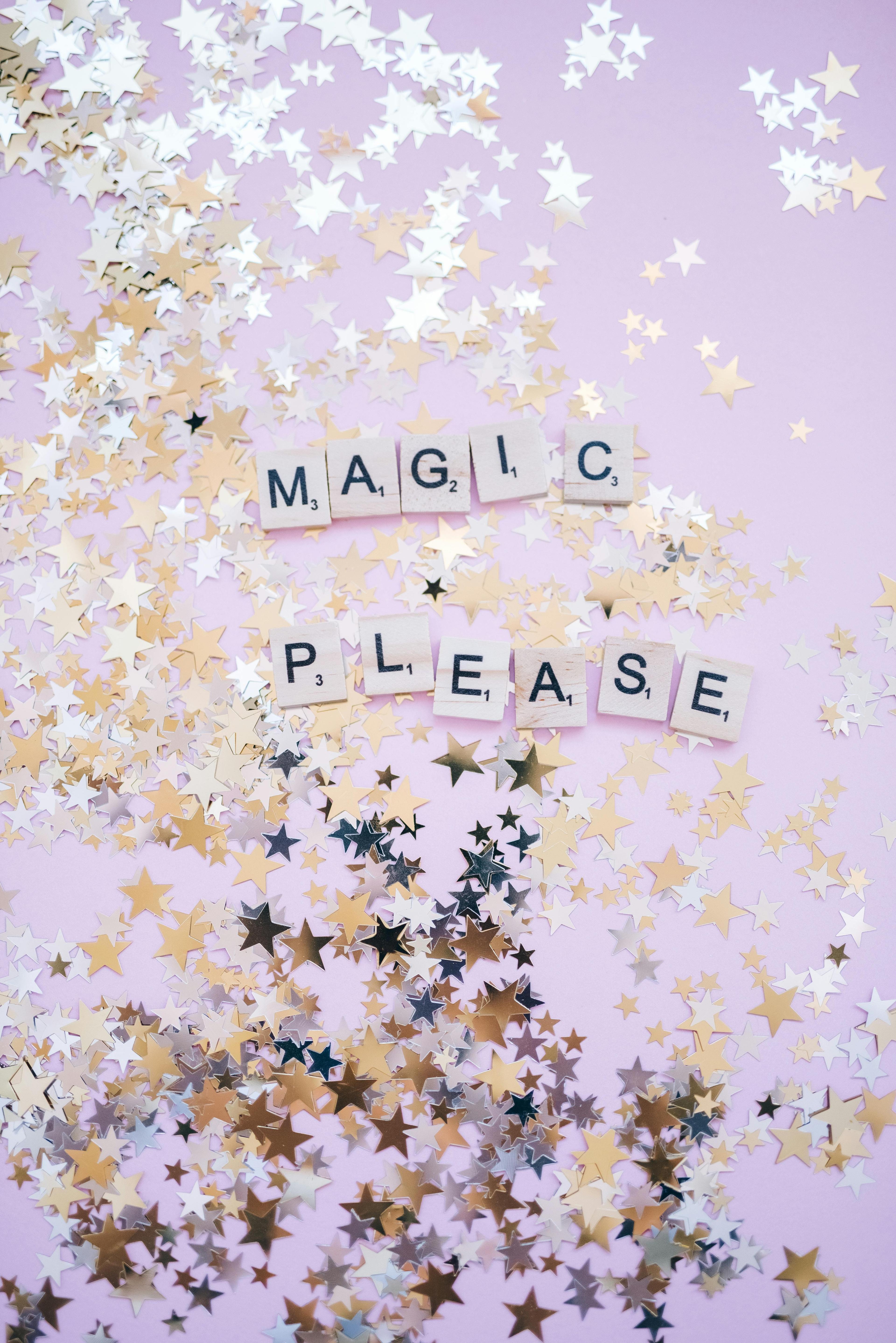 A whimsical background with scattered star confetti and letter tiles spelling 'MAGIC PLEASE'.